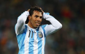 JOHANNESBURG, SOUTH AFRICA - JUNE 27: Carlos Tevez of Argentina celebrates scoring the third goal for his team during the 2010 FIFA World Cup South Africa Round of Sixteen match between Argentina and Mexico at Soccer City Stadium on June 27, 2010 in Johannesburg, South Africa. (Photo by Richard Heathcote/Getty Images)