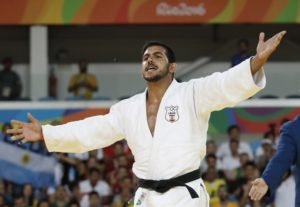 Lebanon's Nacif Elias (white) reacts as he competes with Argentina's Emmanuel Lucenti during their men's -81kg judo contest match of the Rio 2016 Olympic Games in Rio de Janeiro on August 9, 2016. / AFP PHOTO / Jack GUEZ