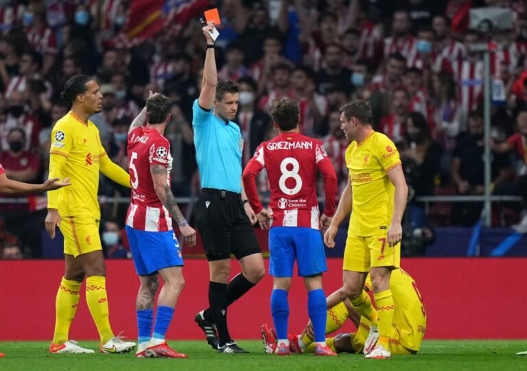 Com chuva de gols e expulsão de Griezmann, Liverpool vence Atléti e segue líder do grupo B