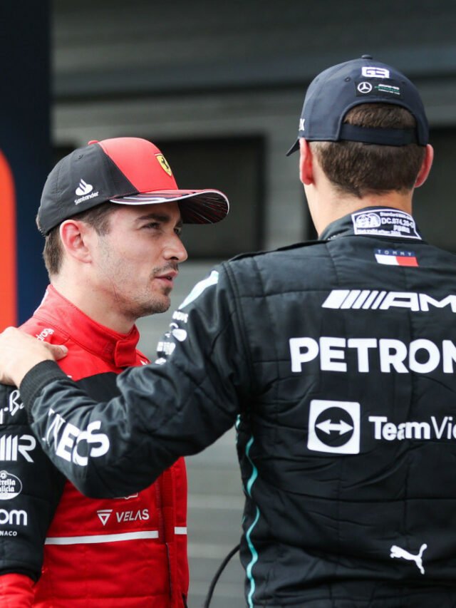 george-russell-hand-on-charles-leclerc-shoulder-planetf1